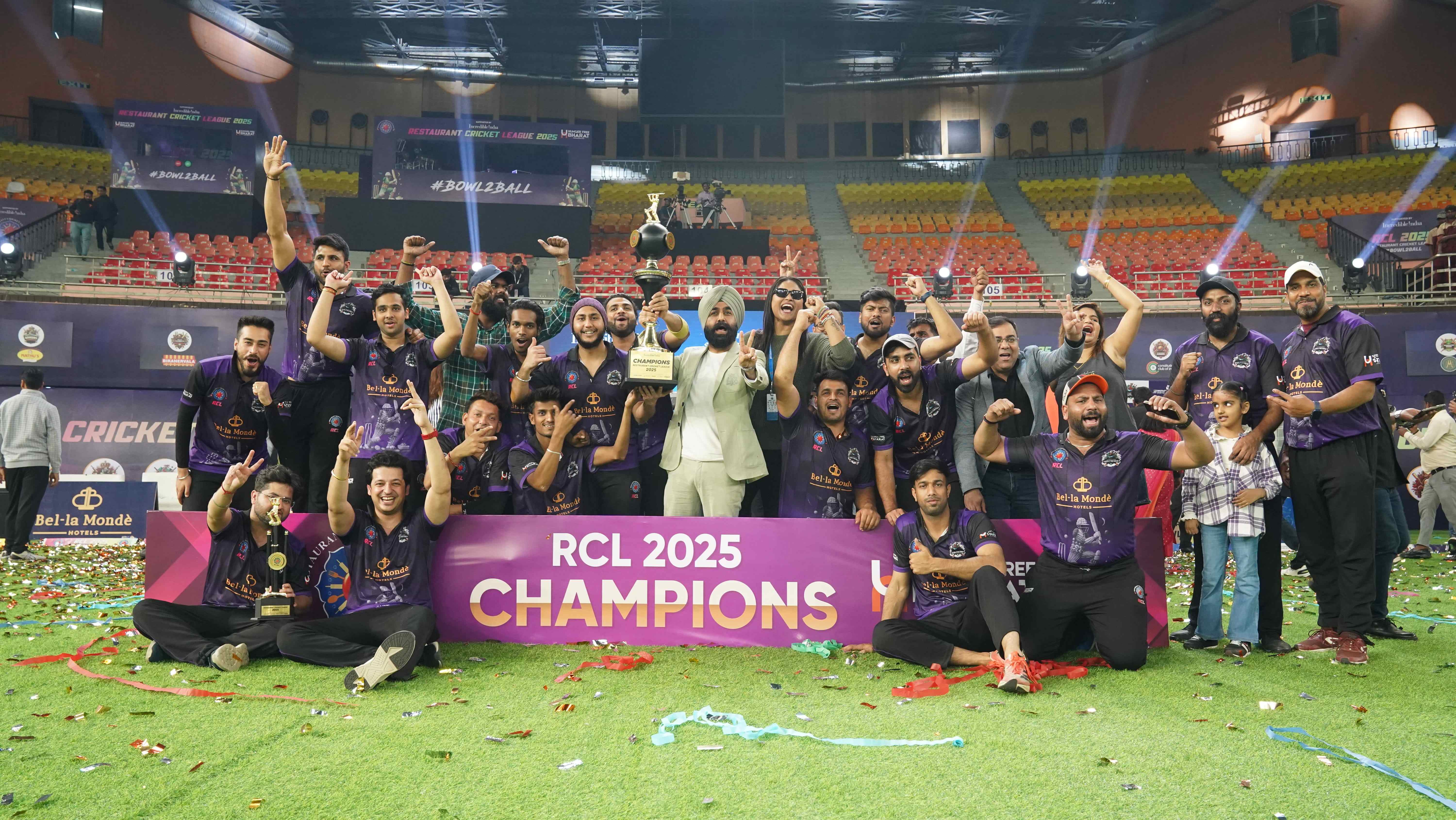Trophy moment — champions lifting the RCL 2025 cup